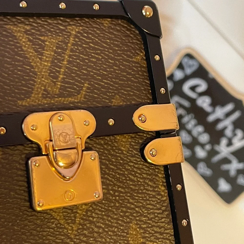 Authentic Louis Vuitton Eye Trunk with Strap for iPhone X/XS - Picture 8 of 12